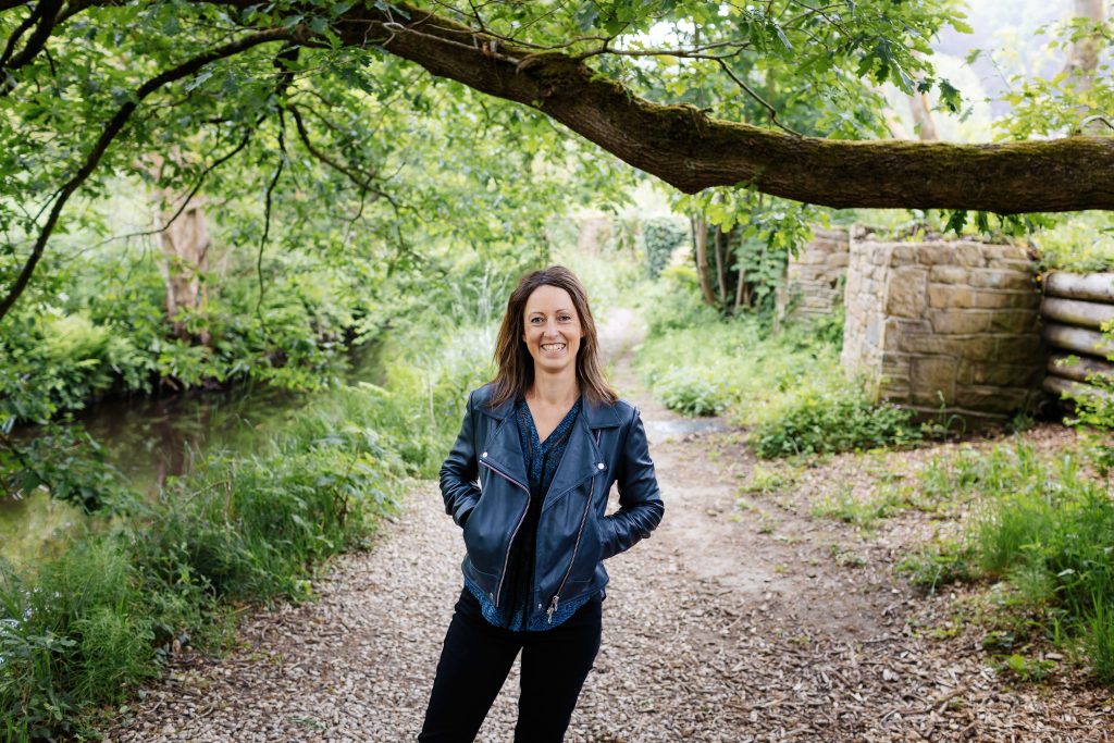 Sophie, of Sophie Seddon PR, stood beneath a tree alongside the river bank in Magdale, Honley, Holmfirth, West Yorkshire.