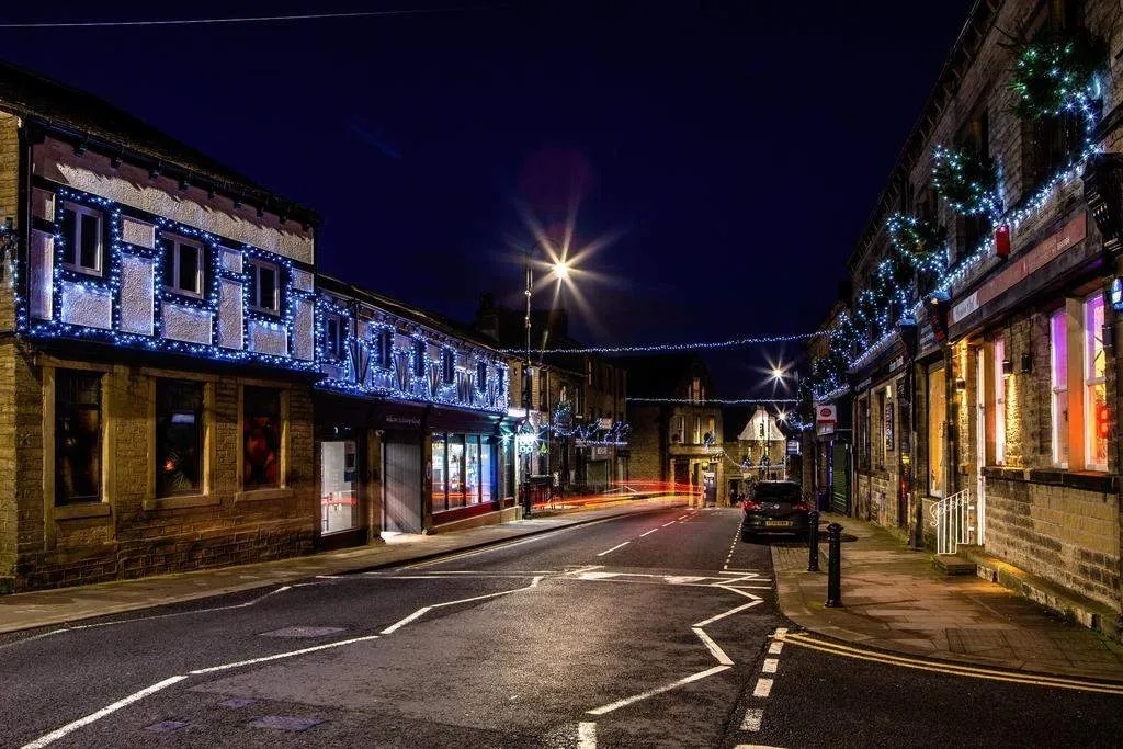Honley Village high street and Christmas lights.