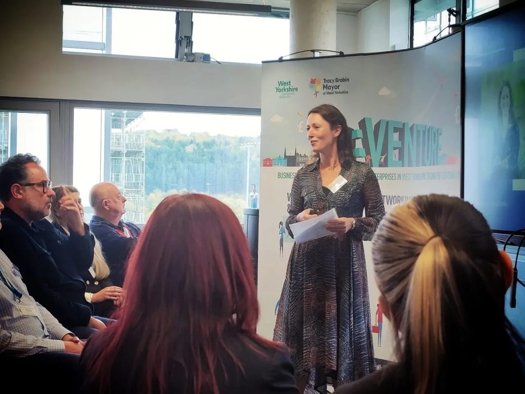 Sophie, of Sophie Seddon PR, talking to people at the AD:VENTURE launch event at The Glass Box in Huddersfield.