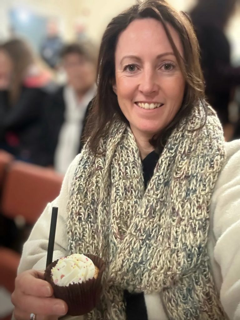 Sophie, of Sophie Seddon PR, a River Holme Connections community open evening, enjoying cake.