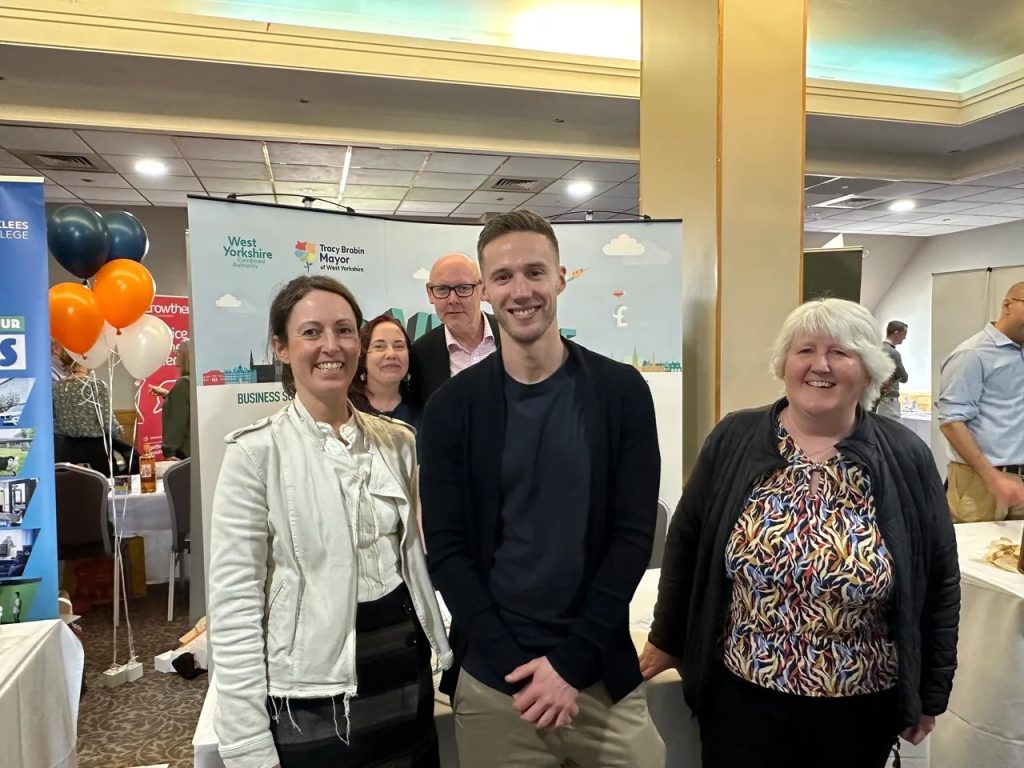 Sophie, of Sophie Seddon PR, at SAM Networking stood in front of the AD:ADVENTURE exhibition at the Cedar Court, Huddersfield.