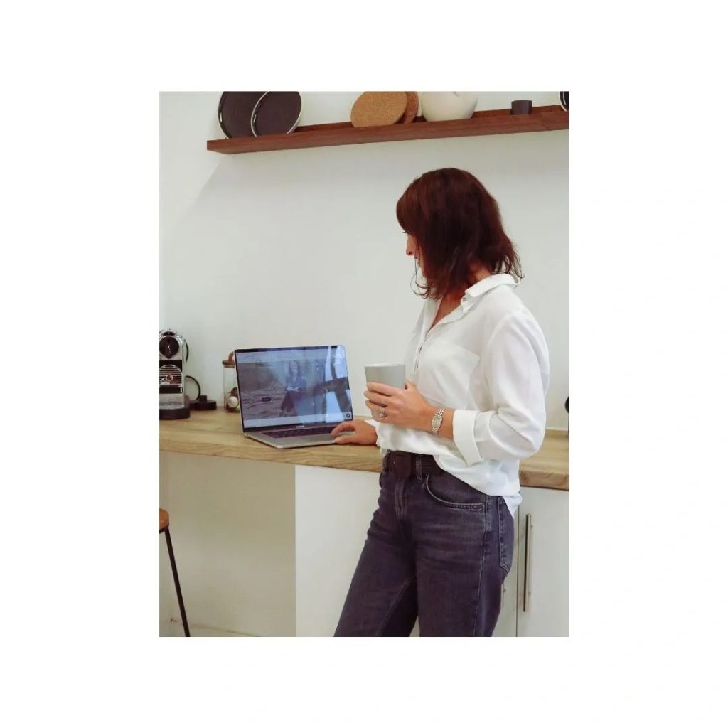 Sophie, of Sophie Seddon PR, stood at her laptop with a mug in her hand.